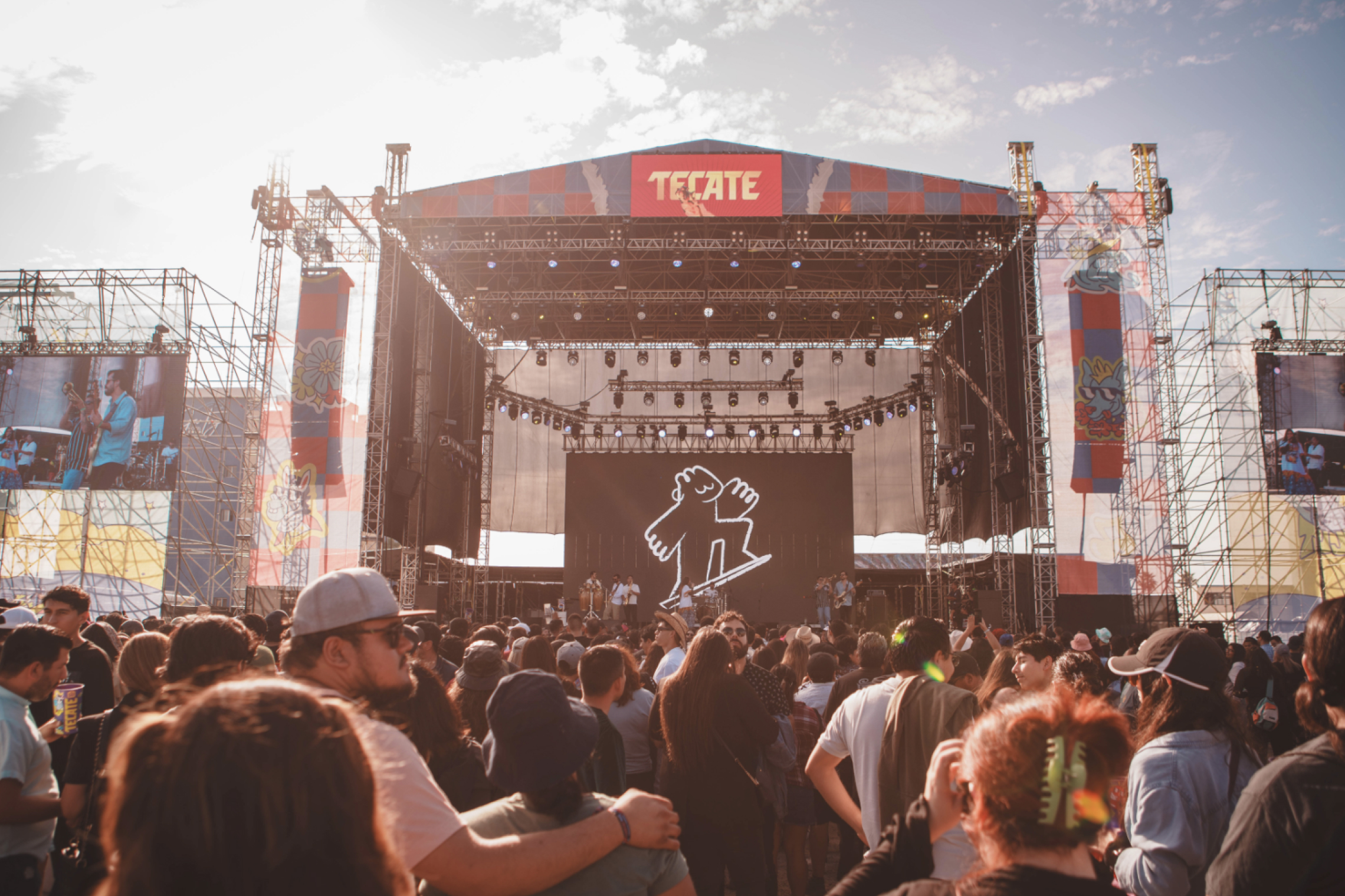 Live performance by La Garfield with animated character on stage screen.