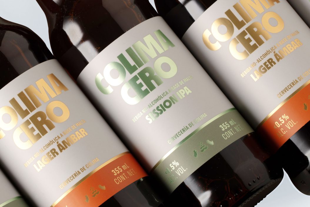 Product photo of Colima Cero bottles with gold and green metallic labels.