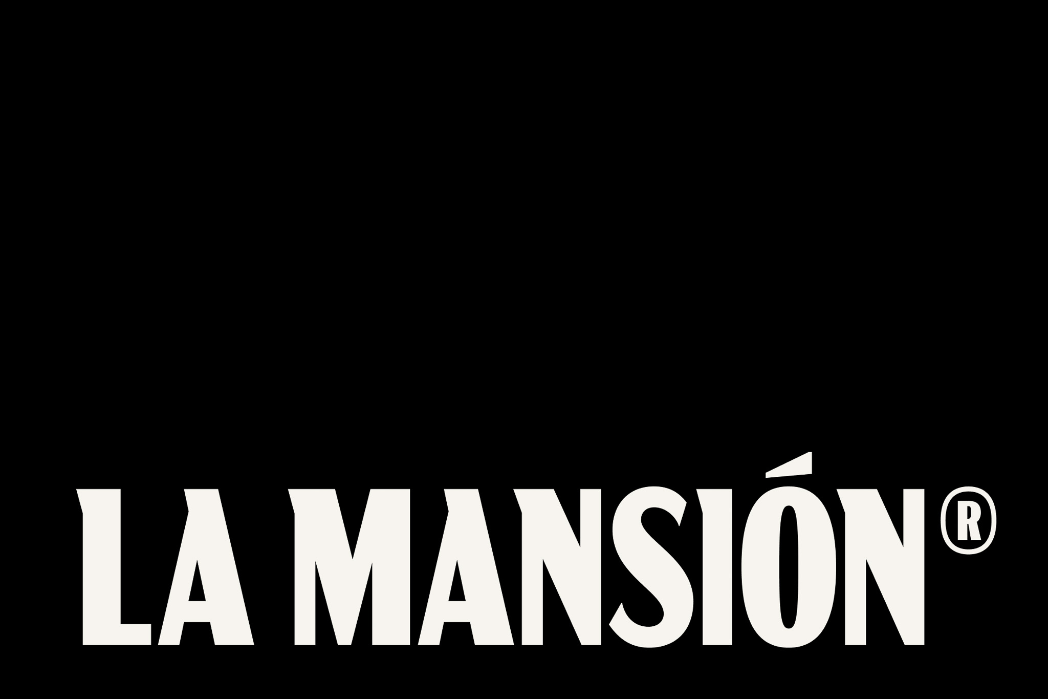 Wordmark de La Mansión sobre fondo negro.