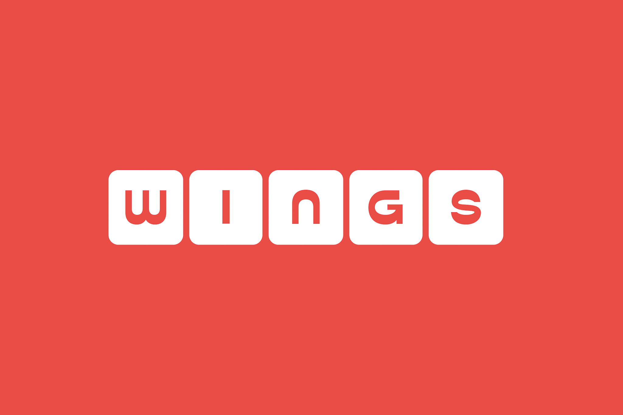 Wings wordmark over red background.